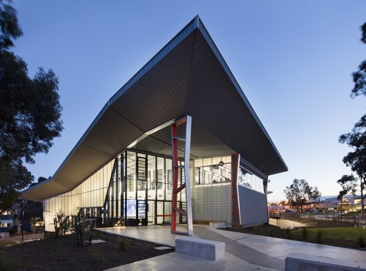 Centre for Advanced Design + Training exterior featuring a geometric roof and curtain wall system of FRP panels from Kalwall