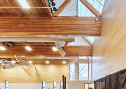 Interior featuring Kalwall skylight set amongst wooden paneling at the James North Baptist Church.